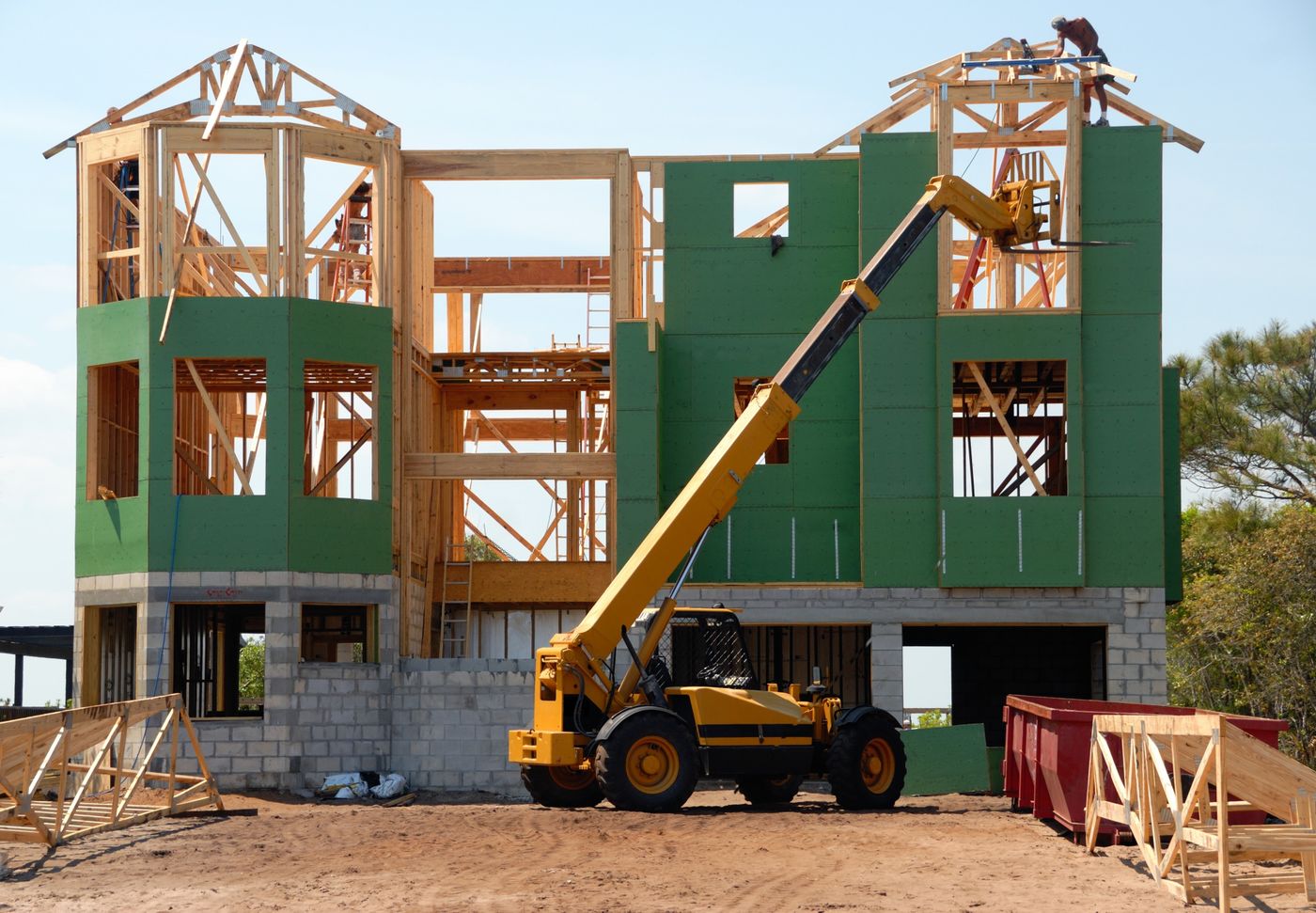 Residential home project with a dumpster on site